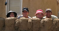 family and mud wal